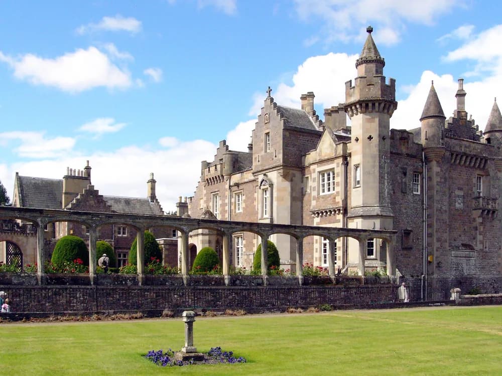 Abbotsford House's Scottish Baronial towers and battlements on the banks of the River Tweed
