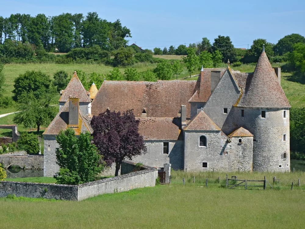 Château de Buranlure in the Berry countryside — a 17th-century French manor in the same family since 1769, near Sancerre and Henrichemont in the Centre-Val de Loire