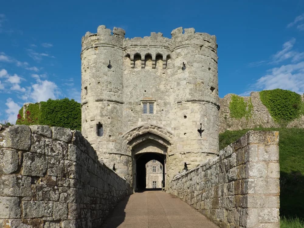 Carisbrooke Castle on the Isle of Wight — the Norman motte, Elizabethan artillery bastions, and gatehouse of the castle where Charles I was imprisoned in 1647-48 and where Princess Beatrice lived until 1944