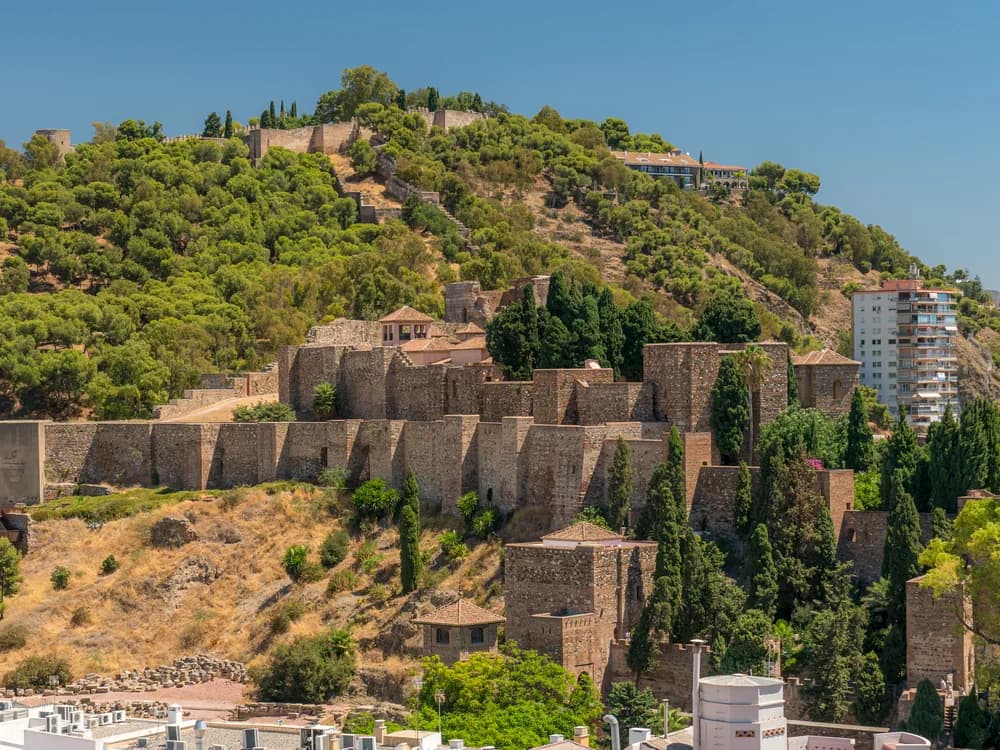 The towers of Castillo de Gibralfaro above the port of Málaga, Andalusia, Spain