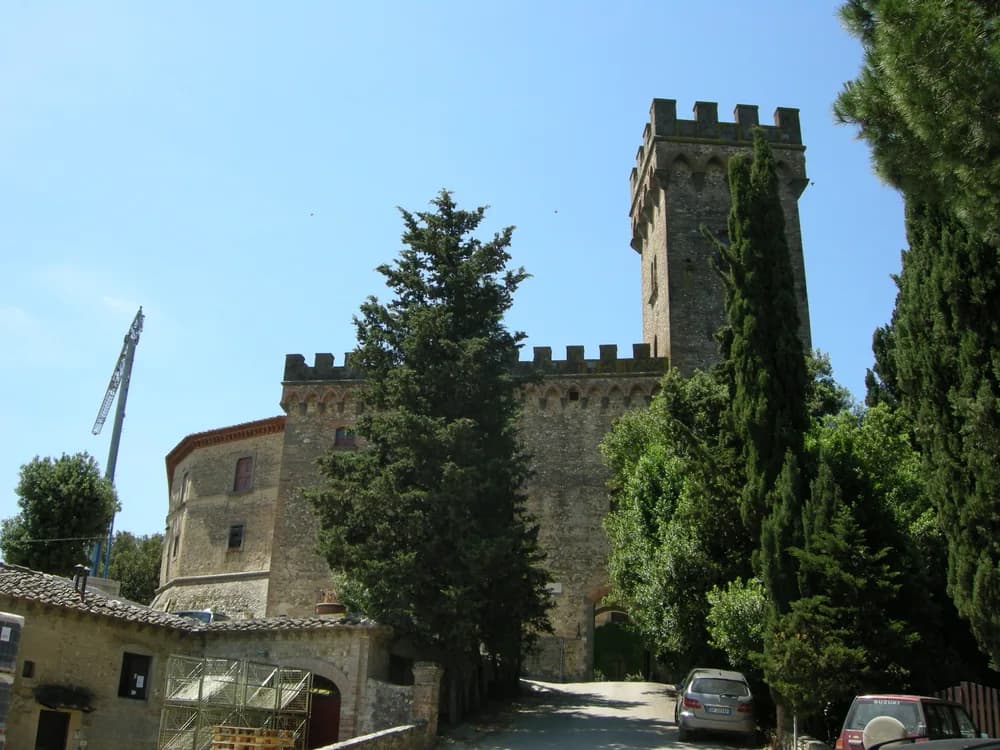 Castello di Poppiano in the Chianti Colli Fiorentini hills southwest of Florence — the Guicciardini family's medieval tower above the estate vineyards and olive groves