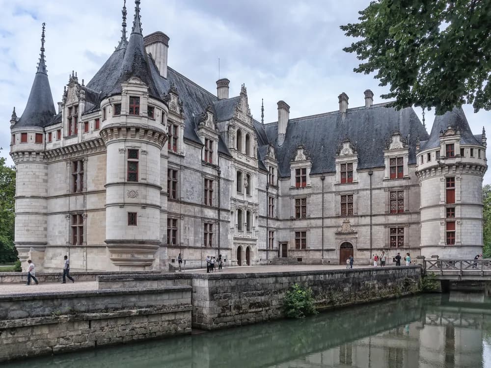Château d'Azay-le-Rideau's Renaissance facade reflected in the still waters of the Indre river