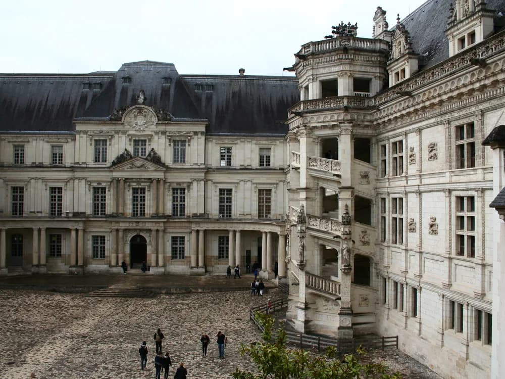 The François I wing of Château de Blois with its famous spiral staircase and Renaissance loggia facade facing the courtyard