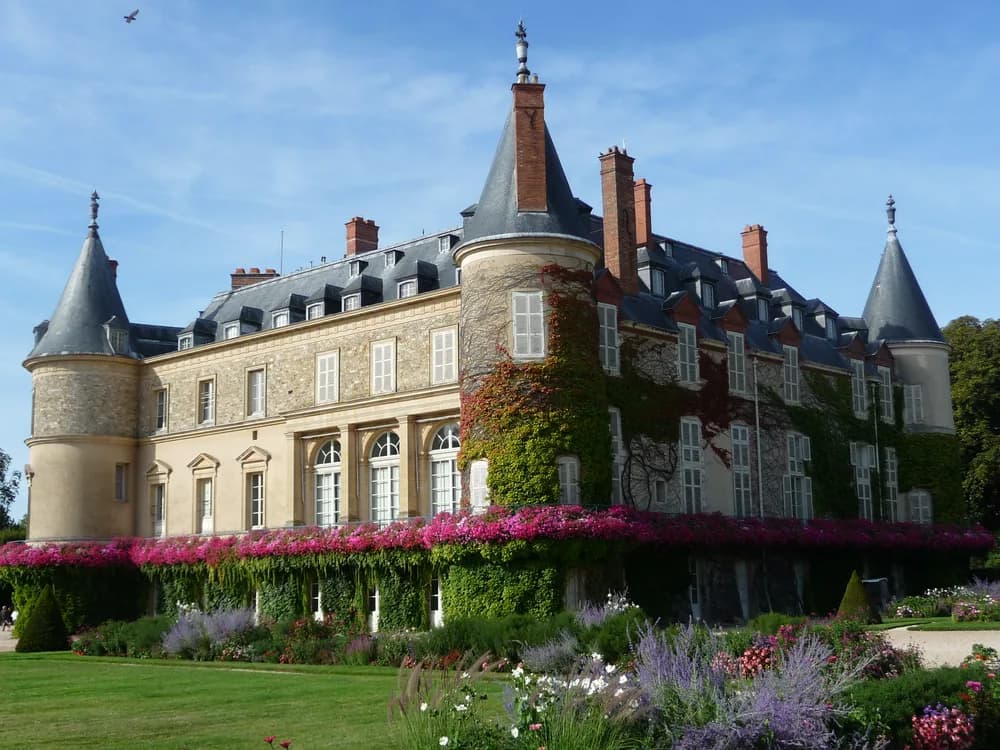 Château de Rambouillet's 18th-century facade and round towers in the Île-de-France forest