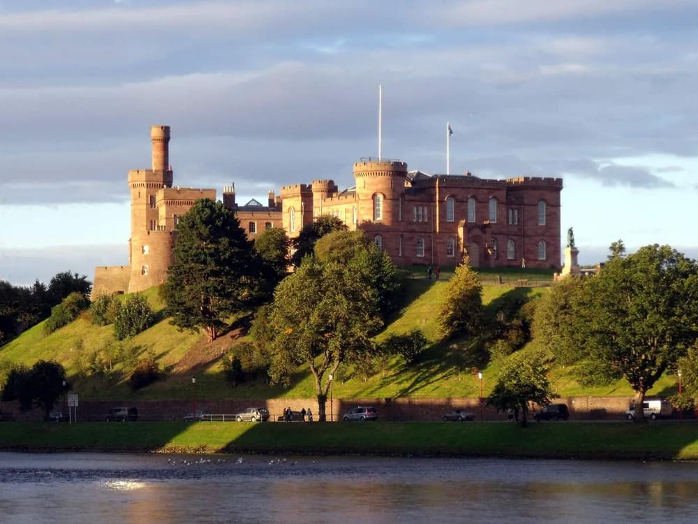Inverness Castle, the Victorian red sandstone fortress on the bluff above the River Ness, home to The Inverness Castle Experience Highland history attraction