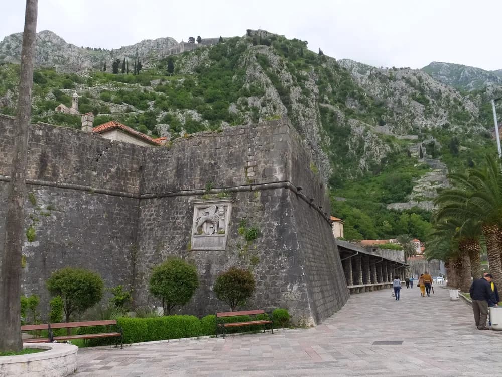 The fortified walls of Kotor climbing the cliffside above the Bay of Kotor in Montenegro