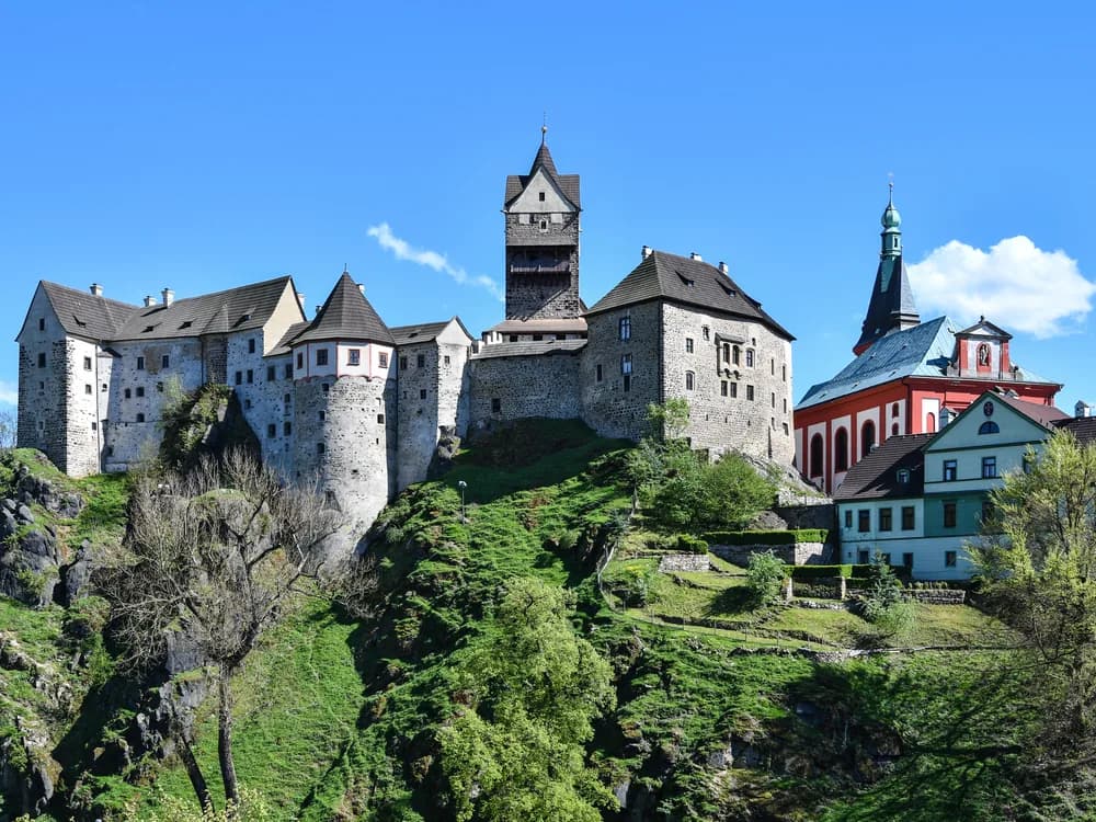 Loket Castle on its rock almost completely encircled by the horseshoe bend of the Ohře River, Czech Republic