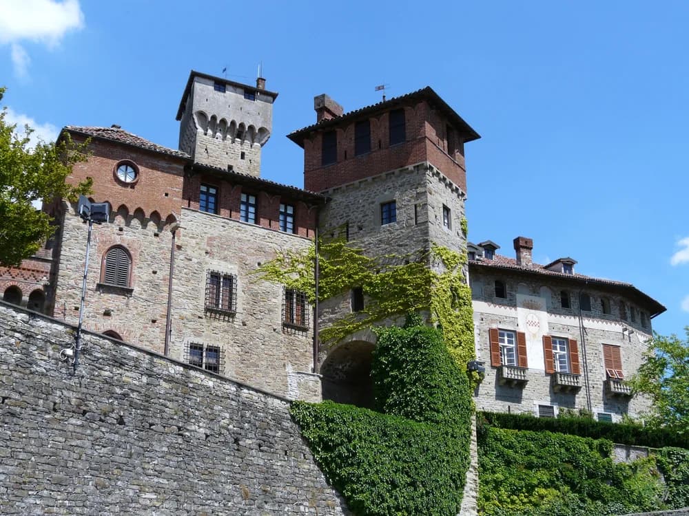 Tagliolo Monferrato Castle in the Piedmontese hills — a medieval fortress in the heart of the UNESCO Monferrato wine landscape, led personally by the Marquis with cellar visit and tasting