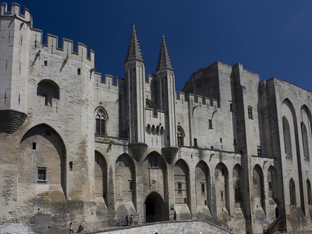 Palais des Papes in Avignon — the largest Gothic palace in the world, built by the medieval papacy between 1334 and 1352 on the Rocher des Doms above the Rhône