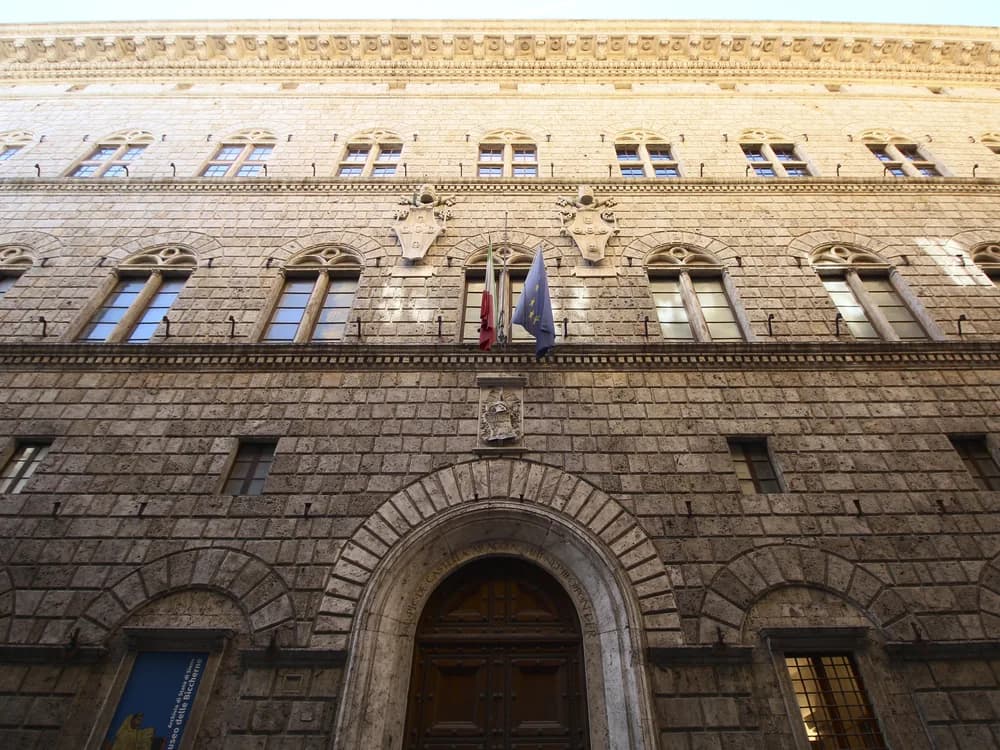 Palazzo delle Papesse courtyard loggia in Siena — the 15th-century Renaissance palace of the Piccolomini popes' female relatives, with Tuscan wine tasting and panoramic terrace views