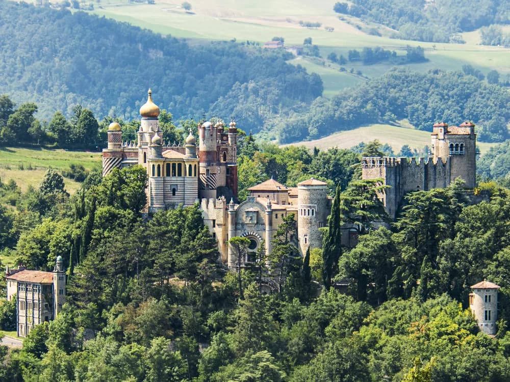 Rocchetta Mattei's eclectic Moorish and Neo-Gothic towers rising on a ridge in the Apennine hills near Bologna