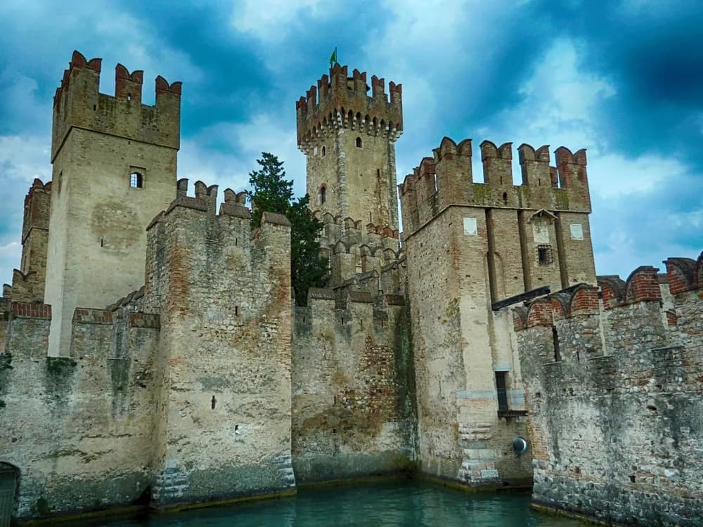 Scaligero Castle rising from the waters of Lake Garda at Sirmione
