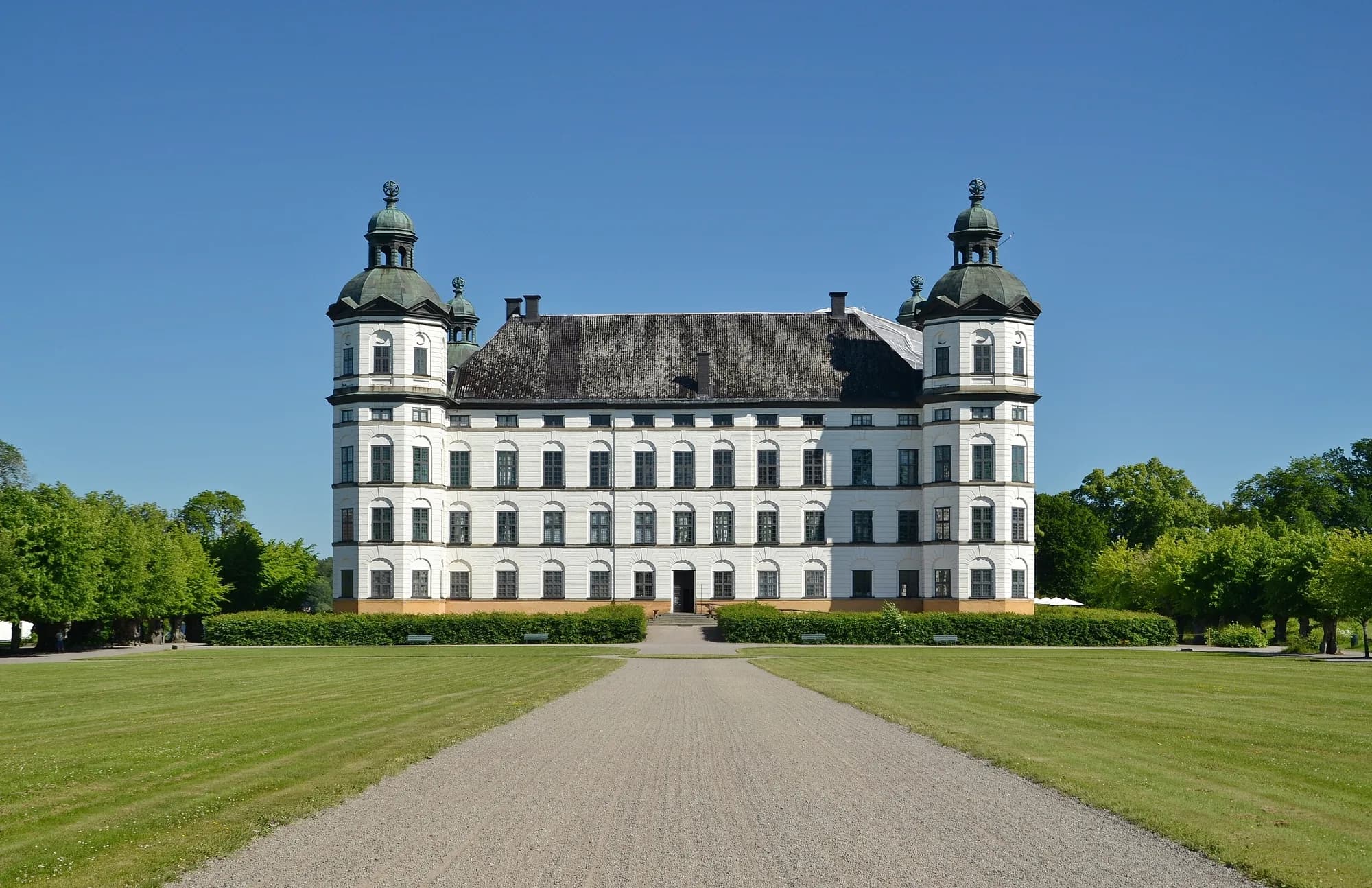 Skokloster Castle's Baroque towers on a peninsula in Lake Mälaren, Sweden