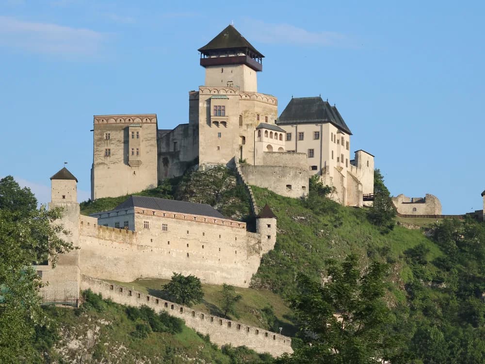 Trenčín Castle towers rising above the Váh River valley and old town in Slovakia