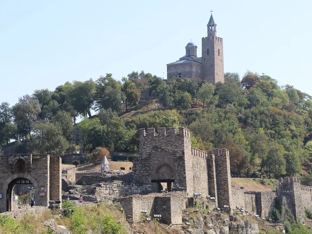 Tsarevets Fortress on its hilltop above the Yantra River gorge with the Cathedral of the Holy Ascension at the summit, Veliko Tarnovo