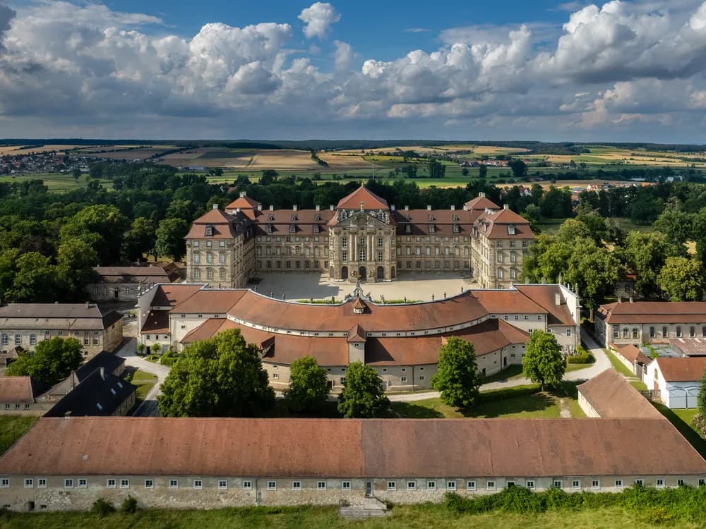 The Baroque facade of Schloss Weißenstein at Pommersfelden, Bavaria, Germany