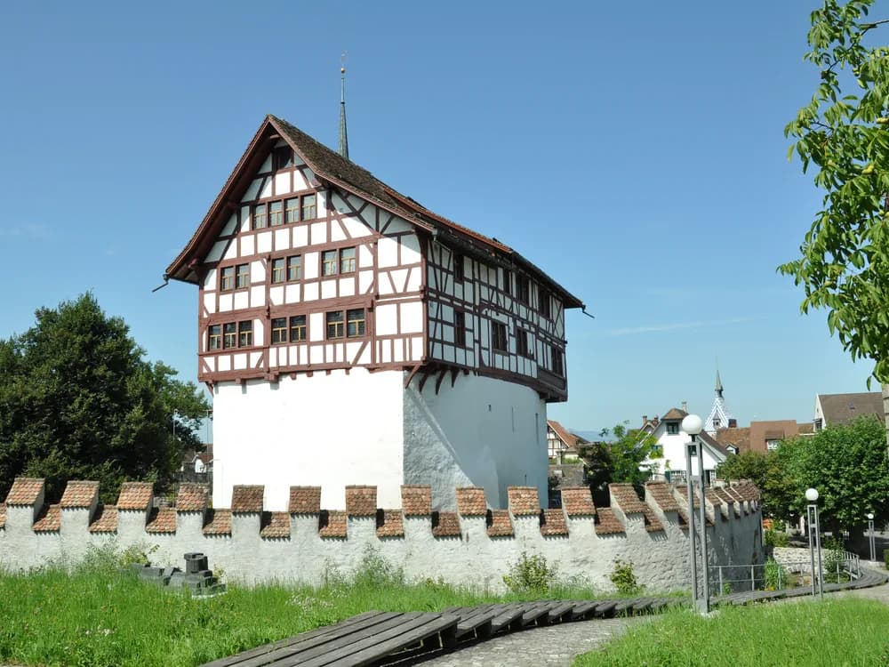 The leaning Zytturm tower of Burg Zug above the old town, Switzerland