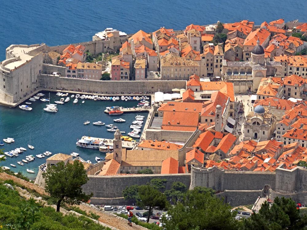 Dubrovnik city walls and Adriatic Sea at sunset