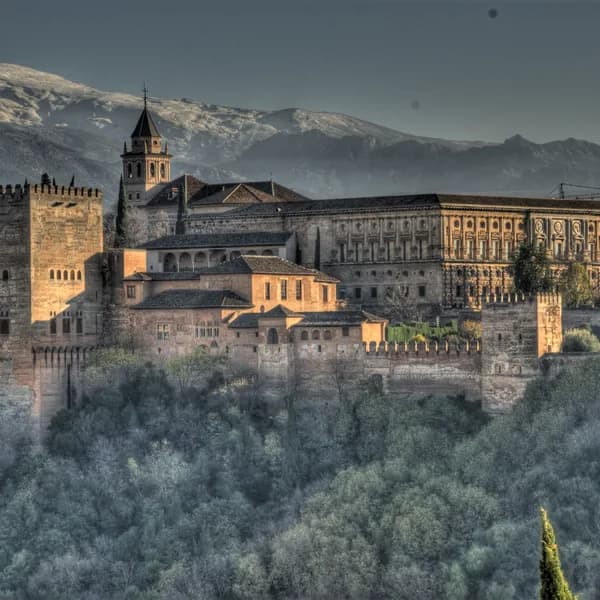 The Alhambra palace complex overlooking Granada at golden hour