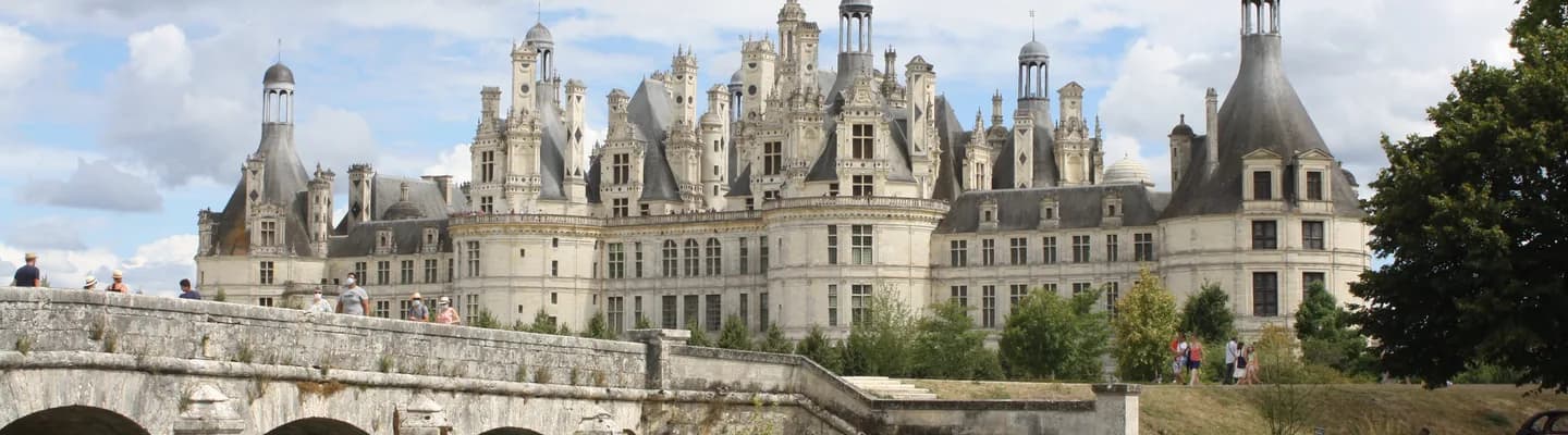 Château de Chambord reflected in the Cosson river at dawn — one of France's greatest châteaux