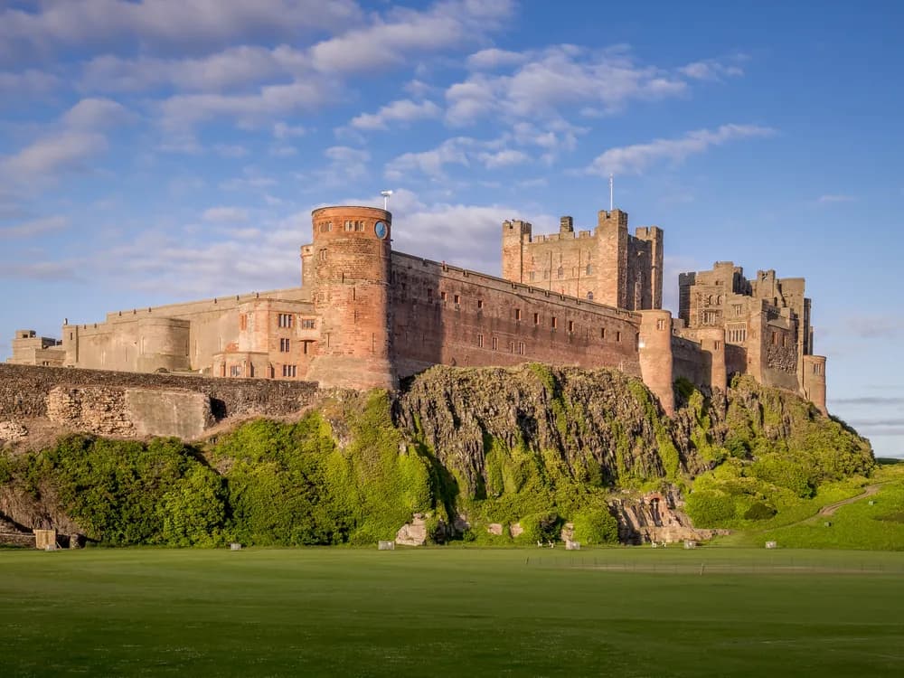 Bamburgh Castle rising from its basalt crag above the Northumberland coast
