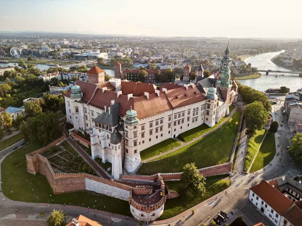 Wawel Castle and Cathedral on the limestone hill above the Vistula river at sunset