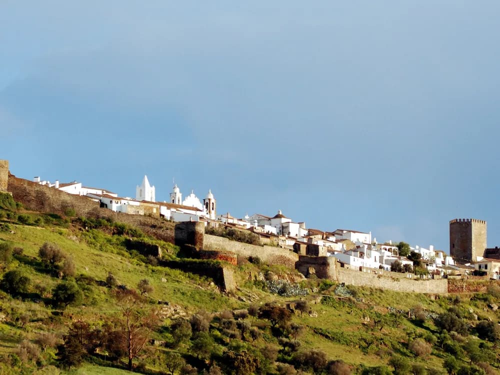 Monsaraz Castle on its hilltop above the Alentejo plain and Alqueva Lake, Portugal