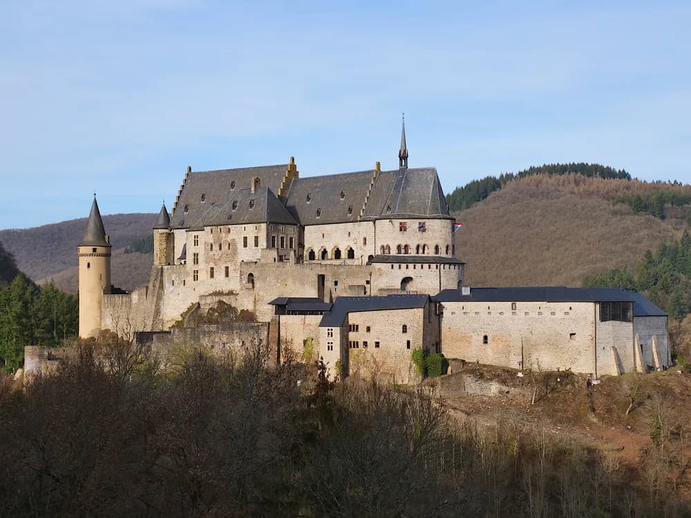 Vianden Castle rising above the Our River valley on its rocky spur, Luxembourg