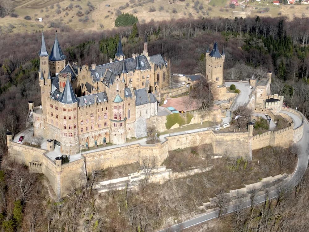 Hohenzollern Castle rising from its peak in the Swabian Alps, Germany