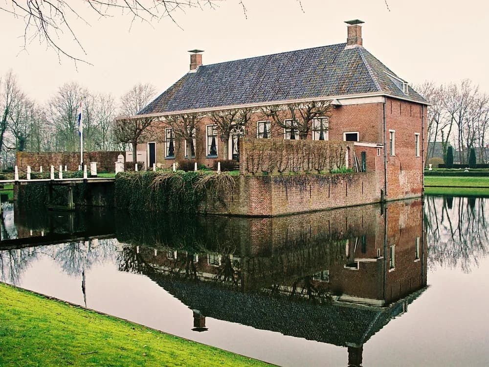 Museum Borg Verhildersum in Leens, Groningen — the moated estate house and farm ensemble in the flat clay landscape of the Hogeland