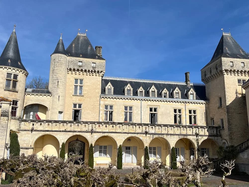 Château de La Rivière above the Dordogne Valley — the 16th-century Fronsadais castle on its limestone promontory with 20km of underground quarry cellars below