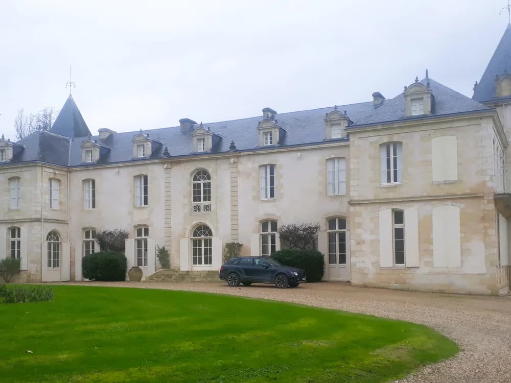 Château de Reignac in Saint-Loubès — the 16th-century estate with a colombier dovecote tasting tower and Eiffel-designed greenhouse on the Bordeaux right bank