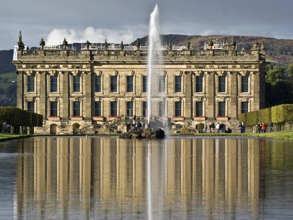 Chatsworth House in the Peak District — the ancestral home of the Dukes of Devonshire, rebuilt in Baroque style 1686–1707, with Capability Brown's landscape and the Emperor Fountain in the foreground
