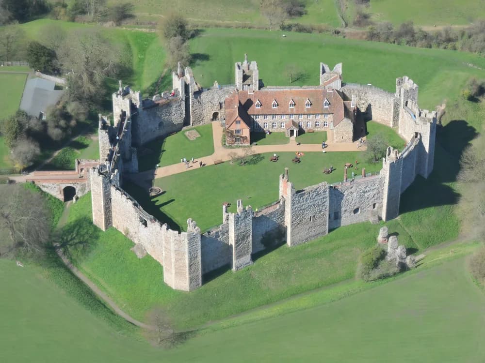Framlingham Castle curtain wall and 13 towers in Suffolk — the English Heritage castle where Mary Tudor rallied her army in 1553, built without a central keep in an unusual 12th-century design
