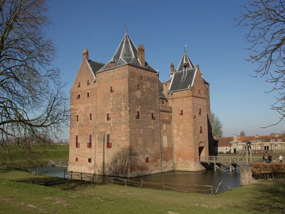 Loevestein Castle at the confluence of the Maas and Waal rivers in Gelderland, Netherlands, seen from the water approach by ferry