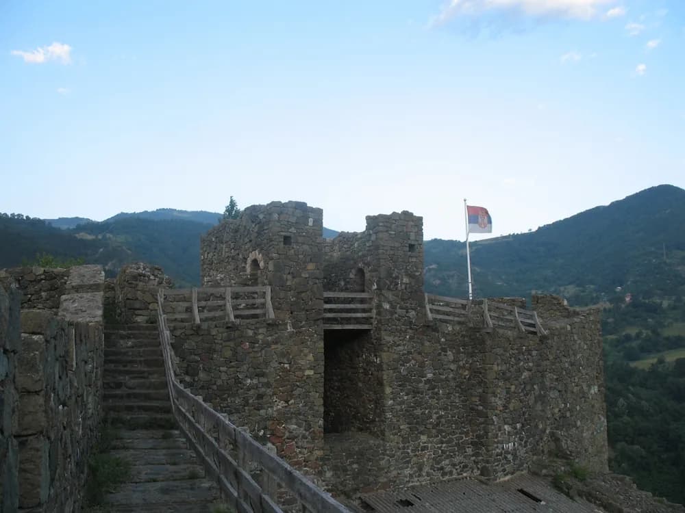 Maglič Fortress above the Ibar River gorge in Serbia — the 13th-century Nemanjić dynasty fortress perched on a rocky outcrop above the mist-filled canyon in the Valley of the Kings region