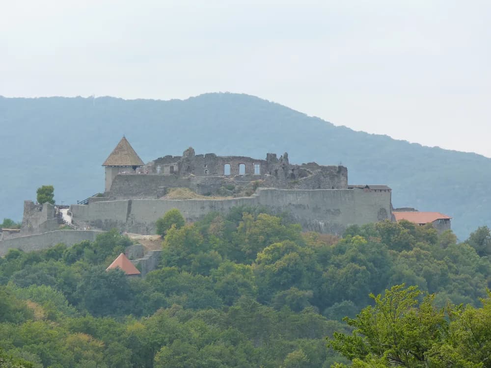 Visegrád Citadel (Fellegvár) on the ridge above the Danube Bend in Hungary — the 13th-century hilltop fortress built by King Béla IV after the Mongol invasion, with panoramic views over the Danube and the Börzsöny hills