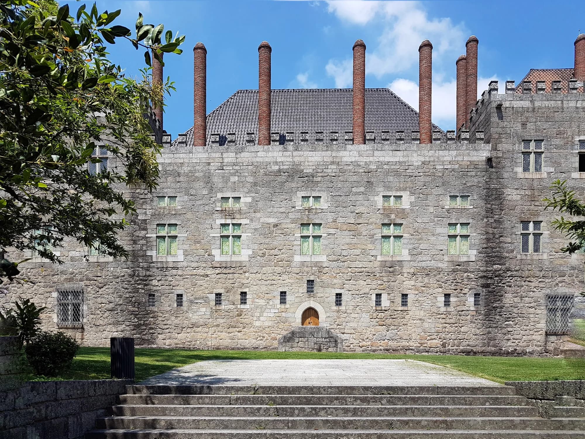 Guimarães Castle keep rising above the UNESCO World Heritage historic centre of Guimarães, Portugal — the birthplace of the Portuguese nation