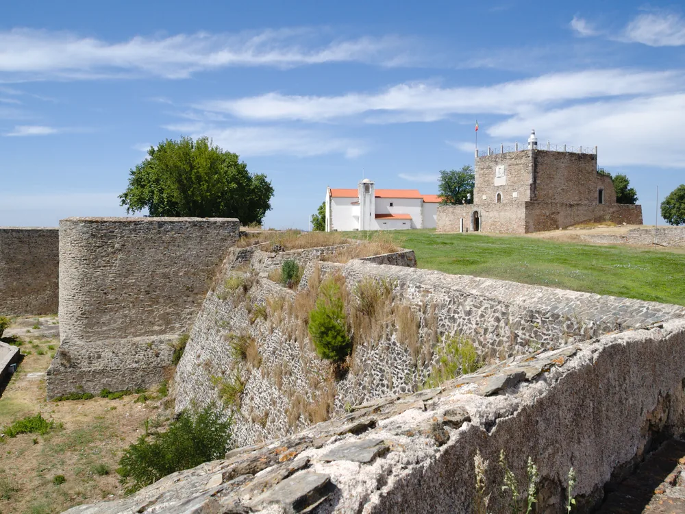 Abrantes Fortress (Castelo de Abrantes) on its hilltop above the Tagus River, Santarém District, Portugal — the medieval castle controlling the strategic Tagus crossing in the Portuguese Ribatejo