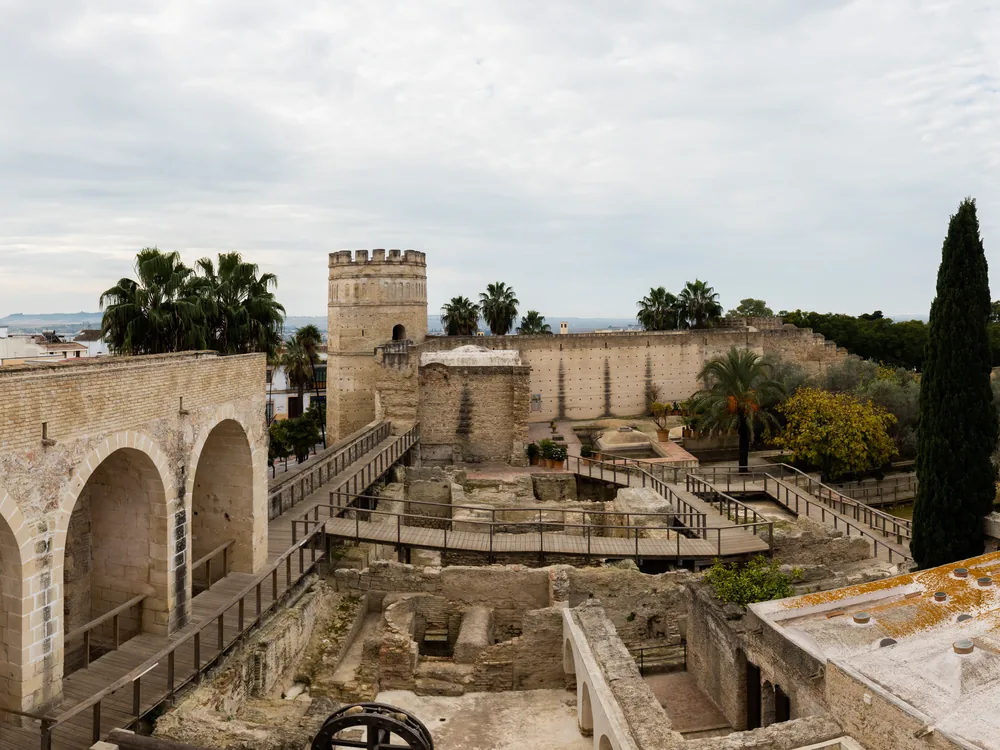 Alcázar of Jerez — the 11th-century Almohad fortress with the mosque, Arab baths, and Islamic gardens at the centre of Jerez de la Frontera in the sherry wine region of Cádiz