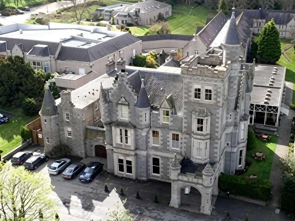Ardoe House on the River Dee near Aberdeen, Scotland, a Scots Baronial mansion built in 1878 modelled on Balmoral Castle