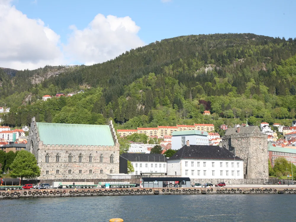 Bergenhus Fortress Håkon's Hall and Rosenkrantz Tower above Bergen harbour with Bryggen visible beyond, Norway