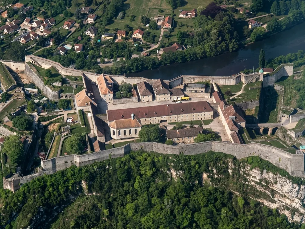Besançon Citadel in Bourgogne-Franche-Comté, France — Vauban's bastioned fortress on the hill closing the Doubs river loop, a UNESCO World Heritage site