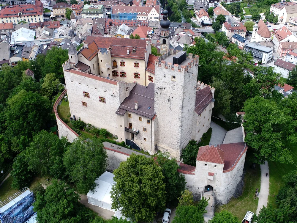 Bruneck Castle (Castel Brunico) — the 13th-century prince-bishop's fortress above the medieval town of Brunico, housing the Messner Mountain Museum Ripa, Puster Valley, South Tyrol, Italy