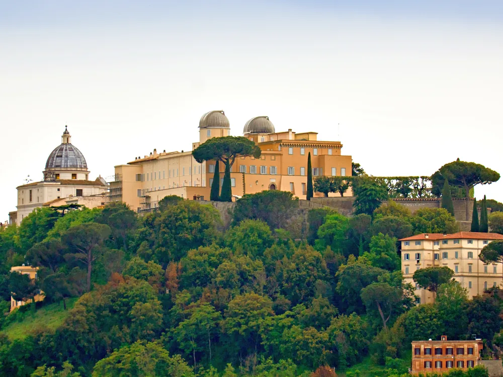The Apostolic Palace of Castel Gandolfo above Lake Albano in the Castelli Romani hills near Rome — the papal summer residence opened to public visits by Pope Francis in 2016
