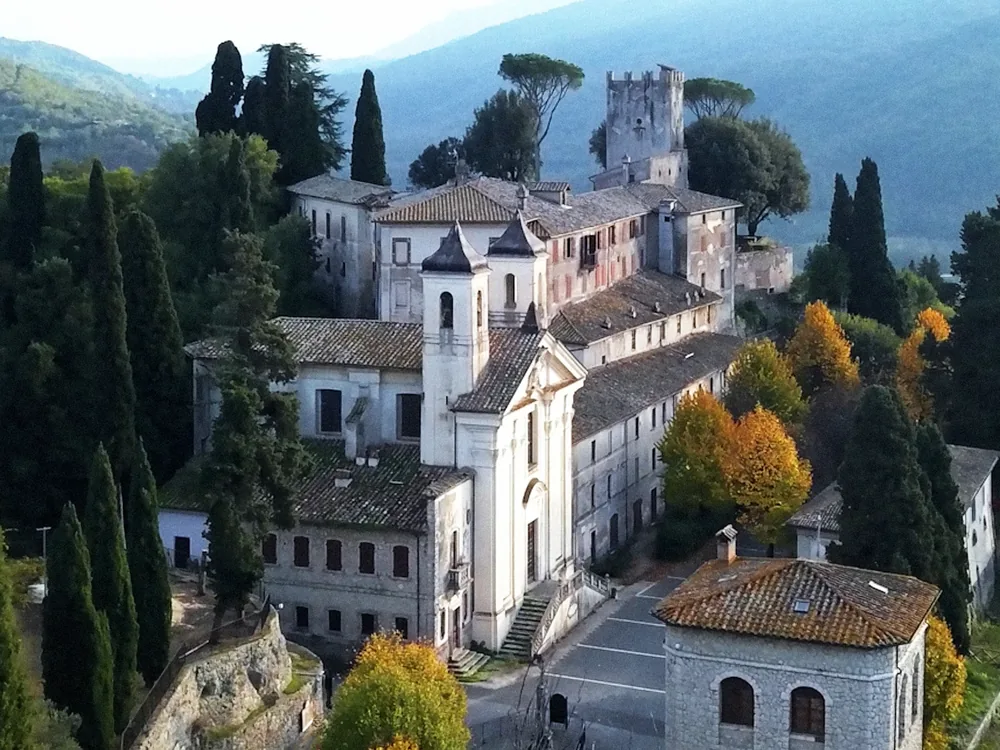 Castello del Gallo rising above the terraced gardens of Mandela in the Sabine Hills east of Rome, with the valley of the Giardini di Orazio stretching below