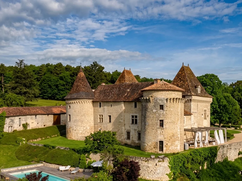 Château de Belet, a 15th-century Périgord castle with genuine battlements and towers, Saint-Aquilin, Dordogne, France