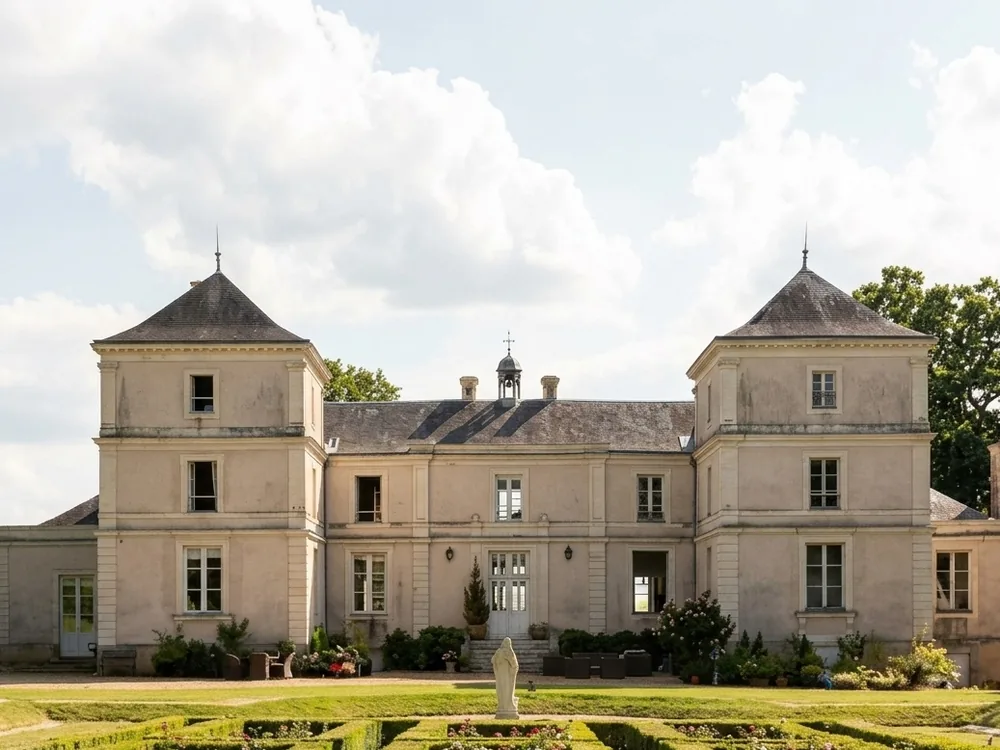 Château de Fesles above the Layon valley in Anjou, France — the 18th-century mansion at the heart of a Bonnezeaux wine estate