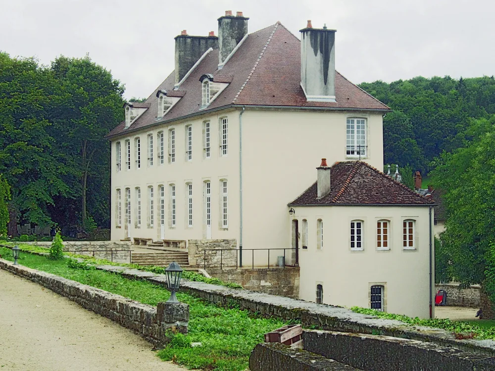 Château de Tavannes in the Châtillonnais countryside of northern Burgundy — the 18th-century classical estate with a medieval turret, listed Historic Monument of France since 1988