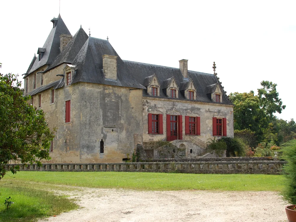 Château Olivier in the Pessac-Léognan appellation — a 14th-century fortified manor 10km from Bordeaux, surrounded by classified vineyards and a 220-hectare biodiversity reserve